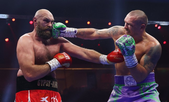 RIYADH, SAUDI ARABIA - DECEMBER 21: Oleksandr Usyk punches Tyson Fury during the IBF, IBO, WBA, WBC and WBO Undisputed World Heavyweight titles' fight between Oleksandr Usyk and Tyson Fury as part of Oleksandr Usyk v Tyson Fury 2, Reignited card at Kingdom Arena on December 21, 2024 in Riyadh, Saudi Arabia. (Photo by Richard Pelham/Getty Images)
