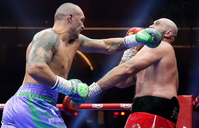 Tyson Fury (right) and Oleksandr Usyk during the WBA, WBC, WBO, IBO World Heavyweight championship contest at the Kingdom Arena in Riyadh, Saudi Arabia. Picture date: Saturday December 21, 2024. PA Photo. See PA story BOXING Fury. Photo credit should read: Nick Potts/PA Wire. RESTRICTIONS: Use subject to restrictions. Editorial use only, no commercial use without prior consent from rights holder.