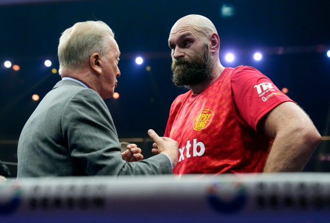 Tyson Fury with Frank Warren following the WBA, WBC, WBO, IBO World Heavyweight championship contest against Oleksandr Usyk at the Kingdom Arena in Riyadh, Saudi Arabia. Picture date: Saturday December 21, 2024. PA Photo. See PA story BOXING Fury. Photo credit should read: Nick Potts/PA Wire. RESTRICTIONS: Use subject to restrictions. Editorial use only, no commercial use without prior consent from rights holder.