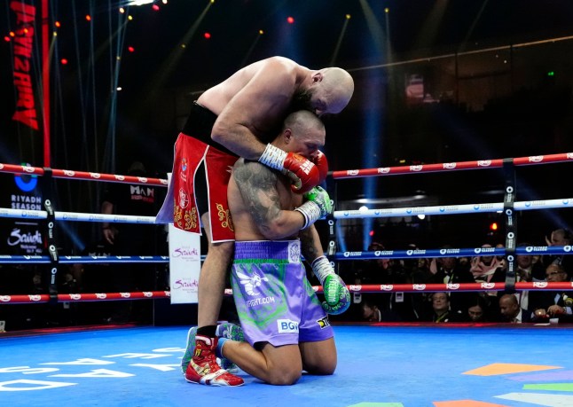 Tyson Fury and Oleksandr Usyk following the WBA, WBC, WBO, IBO World Heavyweight championship contest at the Kingdom Arena in Riyadh, Saudi Arabia. Picture date: Saturday December 21, 2024. PA Photo. See PA story BOXING Fury. Photo credit should read: Nick Potts/PA Wire. RESTRICTIONS: Use subject to restrictions. Editorial use only, no commercial use without prior consent from rights holder.
