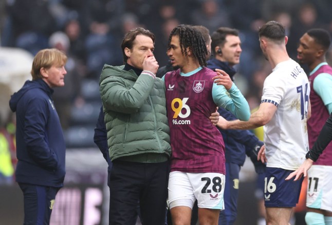 Scott Parker, Manager of Burnley, speaks to Hannibal Mejbri of Burnley after an incident between Hannibal Mejbri of Burnley and Milutin Osmajic of Preston North End (not pictured) during the Sky Bet Championship match between Preston North End FC and Burnley FC
