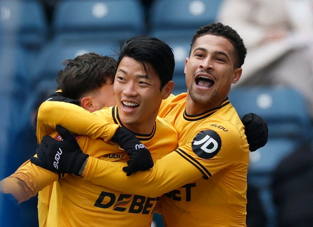 Soccer Football - FA Cup - Fourth Round - Blackburn Rovers v Wolverhampton Wanderers - Ewood Park, Blackburn, Britain - February 9, 2025 Wolverhampton Wanderers' Joao Gomes celebrates scoring their first goal with Wolverhampton Wanderers' Hwang Hee-chan Action Images via Reuters/Jason Cairnduff