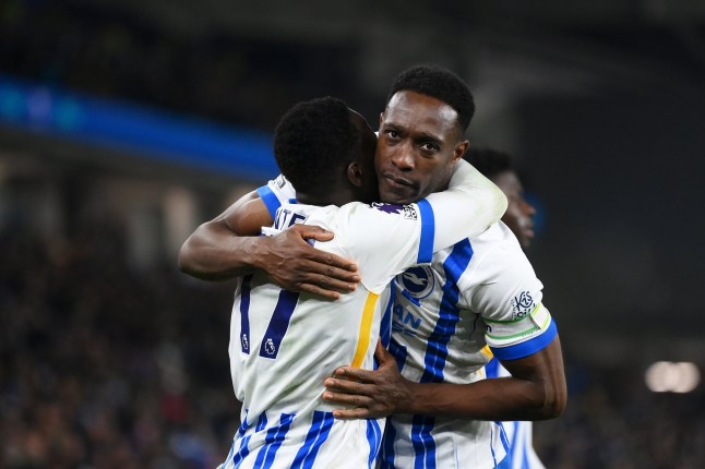 BRIGHTON, ENGLAND - FEBRUARY 14: Danny Welbeck of Brighton & Hove Albion congratulates Yankuba Minteh of Brighton & Hove Albion he scored their side's third goal during the Premier League match between Brighton & Hove Albion FC and Chelsea FC at Amex Stadium on February 14, 2025 in Brighton, England. (Photo by Mike Hewitt/Getty Images)