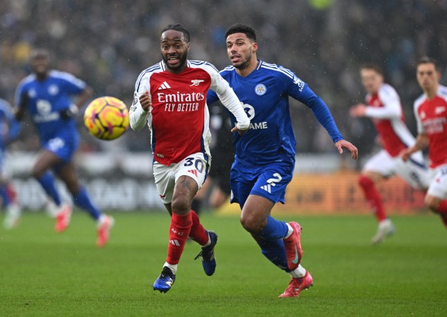 LEICESTER, ENGLAND - FEBRUARY 15: Raheem Sterling of Arsenal chases a loose ball, under pressure from James Justin of Leicester City during the Premier League match between Leicester City FC and Arsenal FC at The King Power Stadium on February 15, 2025 in Leicester, England. (Photo by David Price/Arsenal FC via Getty Images)