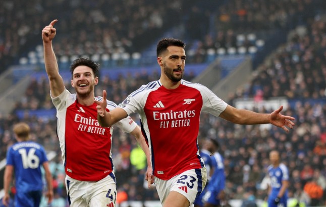 Soccer Football - Premier League - Leicester City v Arsenal - King Power Stadium, Leicester, Britain - February 15, 2025 Arsenal's Mikel Merino celebrates scoring their first goal with Declan Rice REUTERS/Chris Radburn EDITORIAL USE ONLY. NO USE WITH UNAUTHORIZED AUDIO, VIDEO, DATA, FIXTURE LISTS, CLUB/LEAGUE LOGOS OR 'LIVE' SERVICES. ONLINE IN-MATCH USE LIMITED TO 120 IMAGES, NO VIDEO EMULATION. NO USE IN BETTING, GAMES OR SINGLE CLUB/LEAGUE/PLAYER PUBLICATIONS. PLEASE CONTACT YOUR ACCOUNT REPRESENTATIVE FOR FURTHER DETAILS..