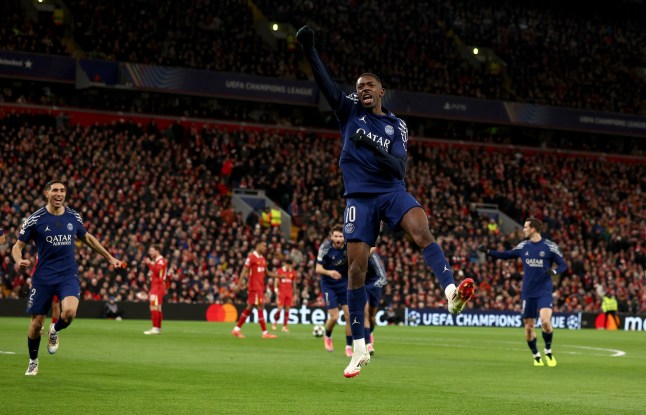 epa11957071 Ousmane Dembele of PSG celebrates after scoring the opening goal during the UEFA Champions League Round of 16, 2nd leg soccer match between Liverpool FC and Paris Saint-Germain, in Liverpool, Britain, 11 March 2025. EPA/ADAM VAUGHAN