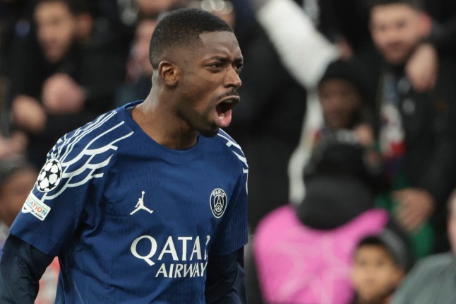 LIVERPOOL, ENGLAND - MARCH 11: Ousmane Dembele of PSG celebrates scoring his penalty during the penalty shootout of the UEFA Champions League 2024/25 UEFA Champions League 2024/25 Round of 16 Second Leg match between Liverpool FC and Paris Saint-Germain (PSG) at Anfield on March 11, 2025 in Liverpool, England. (Photo by Jean Catuffe/Getty Images)
