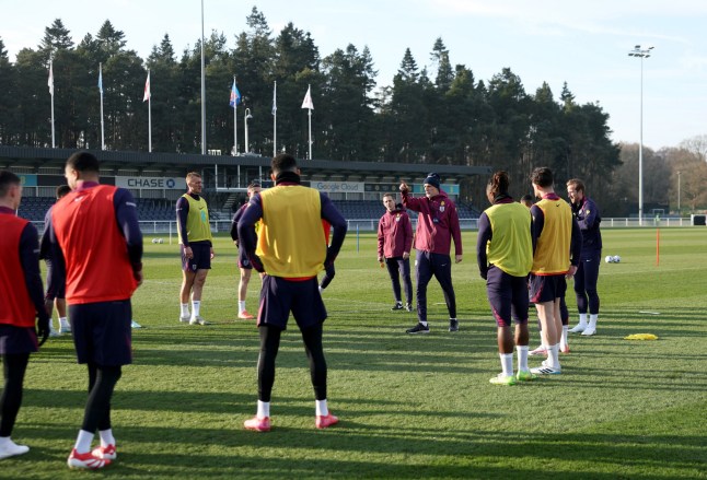BURTON UPON TRENT, ENGLAND - MARCH 19: Thomas Tuchel, Head Coach of England, talks to players during a training session at St George's Park on March 19, 2025 in Burton upon Trent, England. (Photo by Eddie Keogh - The FA/The FA via Getty Images)