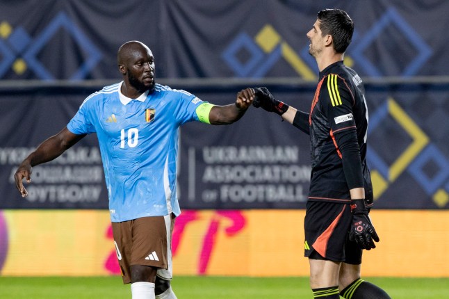 epa11977219 Belgium's goalkeeper Thibaut Courtois (R) fist bumps teammate Romelu Lukaku (L) during the UEFA Nations League quarter final first leg soccer match between Ukraine and Belgium, in Murcia, Spain, 20 March 2025. EPA/Marcial Guillen